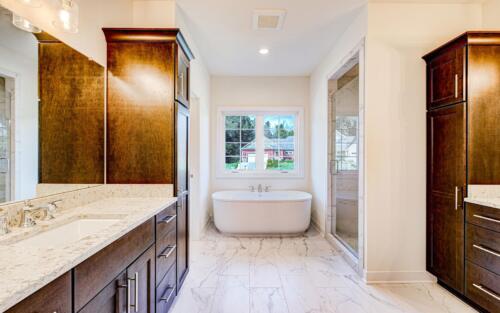 Master suite with soaking tub and two walk in closets